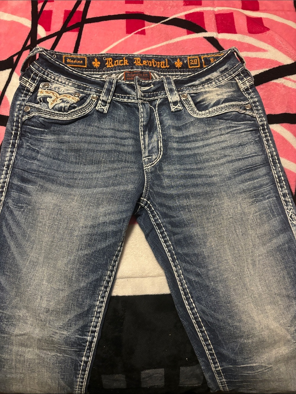 Rock Revival Woman’s Faded Blue Slim Straight Jeans